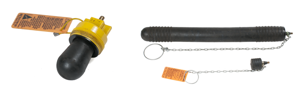 "Image showing two inflatable test plugs: one on the left for use in a line cleanout and one on the right for use in a wye cleanout, both with attached warning tags."